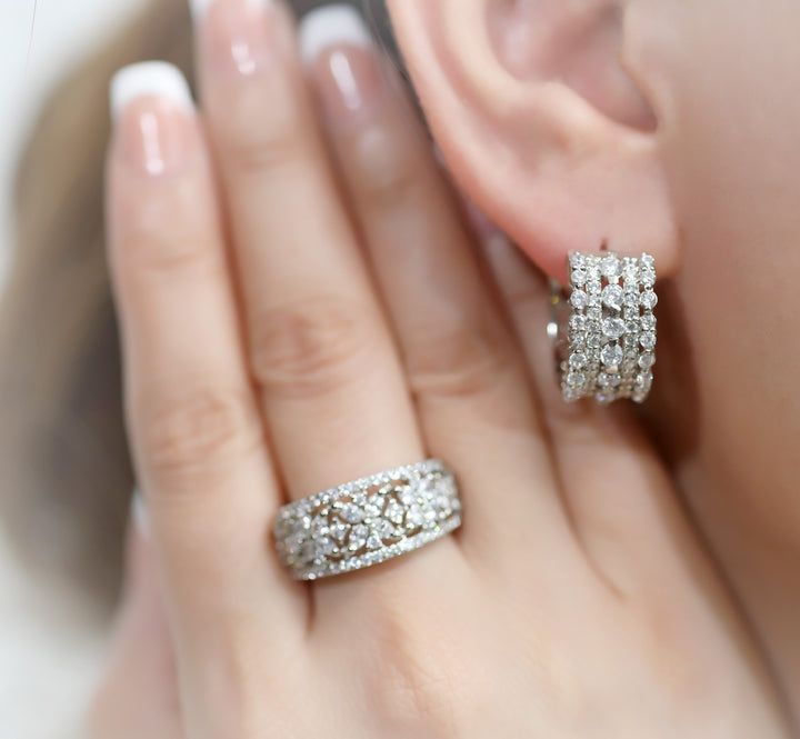 Penzy Band ring on a finger behind ear product of Jewels by RF